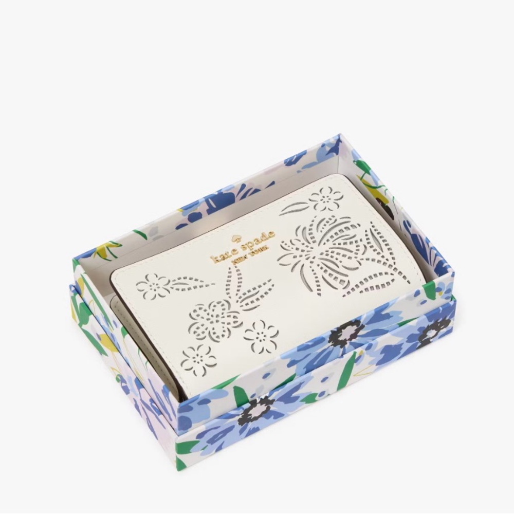 Kate Spade Boxed Madison Perforated Medium Ivory  Floral Bifold Wallet NWT.